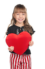 Image showing Little girl with red heart