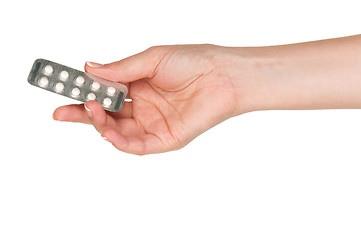 Image showing Hand with pills