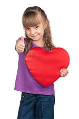 Image showing Little girl with red heart