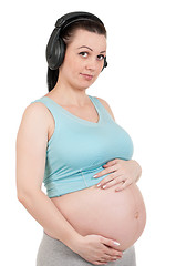 Image showing Pregnant belly with headphones