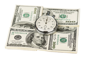 Image showing Dollars and stopwatch