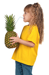 Image showing Little girl with pineapple