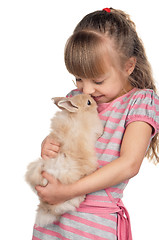 Image showing Little girl with rabbit