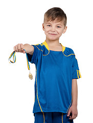 Image showing Boy in ukrainian national soccer uniform