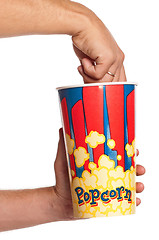 Image showing Hand with popcorn