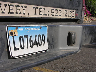 Image showing SANTO DOMINGO, DOMINICAN REPUBLIC - DEC 20: Old car stops at tra