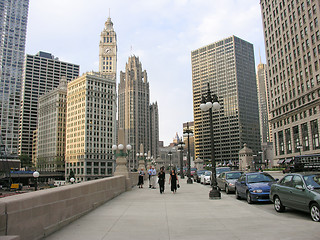 Image showing CHICAGO - AUG 5: Tourists walk in downtown streets, August 5, 20