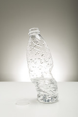 Image showing Twisted distorted bottle of water