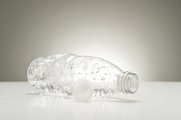 Image showing Clear plastic water bottle with droplets