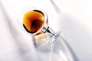 Image showing Rich brown aged cognac in elegant snifter
