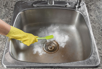 Image showing Cleaning the kitchen sink