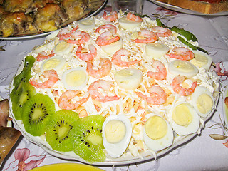 Image showing dish decorated kiwi, boiled eggs and shrimps