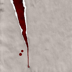 Image showing ripped paper with blood