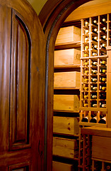 Image showing mahogany door and wine cellar