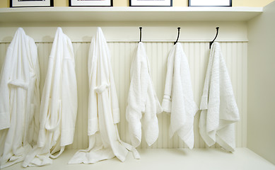 Image showing locker room with bathrobes towels