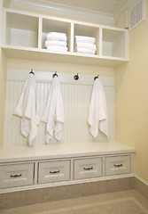 Image showing locker room with bathrobes towels