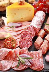 Image showing Antipasto catering platter with red wine