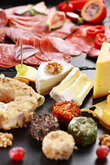 Image showing Antipasto catering platter with red wine