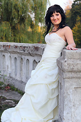 Image showing Girl in the wedding dress in the park