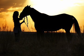 Image showing Woman and horse