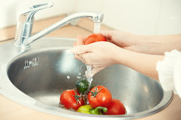 Image showing Washing vegetables
