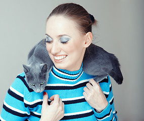 Image showing Lady and cat