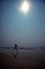 Image showing Running at the beach