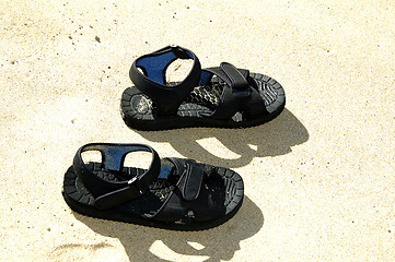 Image showing Sandals by the beach