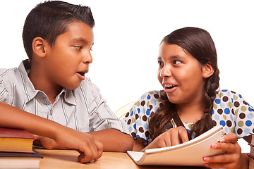 Image showing Hispanic Brother and Sister Having Fun Studying