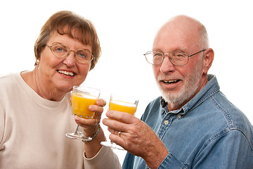 Image showing Happy Senior Couple with Glasses of Orange Juice