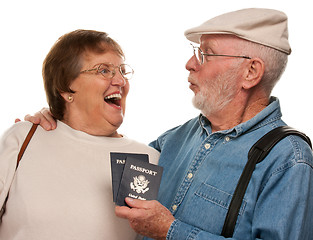 Image showing Happy Senior Couple with Passports and Bags on White