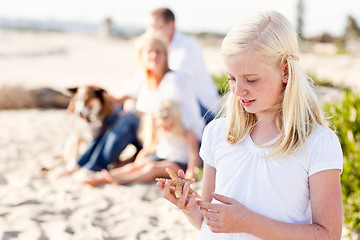 Image showing Adorable Little Blonde Girl with Starfish