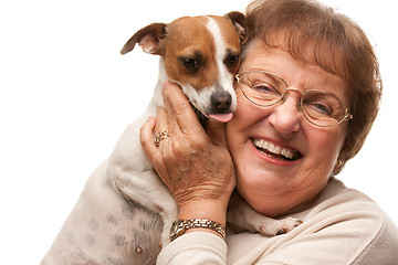 Image showing Happy Attractive Senior Woman with Puppy on White