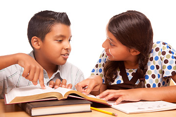 Image showing Hispanic Brother and Sister Having Fun Studying