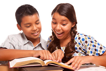 Image showing Hispanic Brother and Sister Having Fun Studying