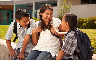 Image showing Hispanic Brothers and Sister Talking Ready for School