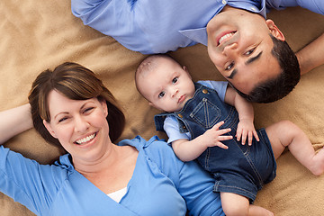 Image showing Mixed Race Family Playing on the Blanket