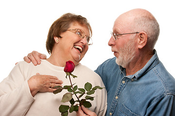 Image showing Happy Senior Husband Giving Red Rose to Wife
