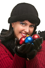 Image showing Attractive Woman Holding Christmas Ornaments