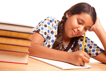 Image showing Pretty Hispanic Girl Studying
