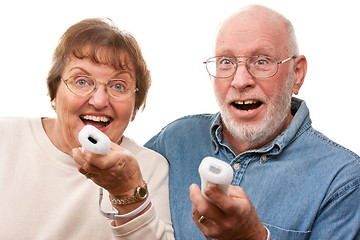 Image showing Happy Senior Couple Play Video Game with Remotes