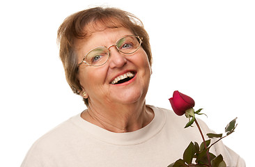 Image showing Attractive Senior Woman with Red Rose
