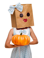 Image showing Girl Wearing a Blue Dress and Happy Bag Face