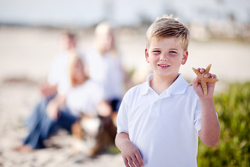 Image showing Cute Little Blonde Boy Showing Off His Starfish