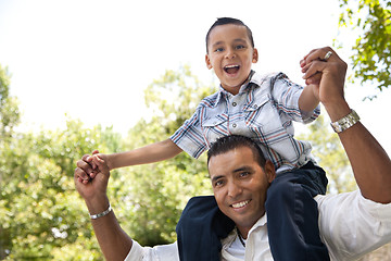 Image showing Hispanic Father and Son Having Fun in the Park