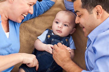 Image showing Mixed Race Family Playing on the Blanket