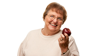 Image showing Attractive Senior Woman with Red Apple
