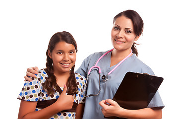 Image showing Pretty Hispanic Girl and Female Doctor Isolated