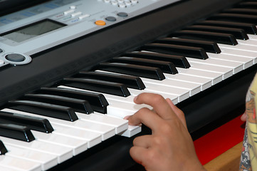 Image showing Playing the piano