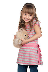 Image showing Little girl with rabbit